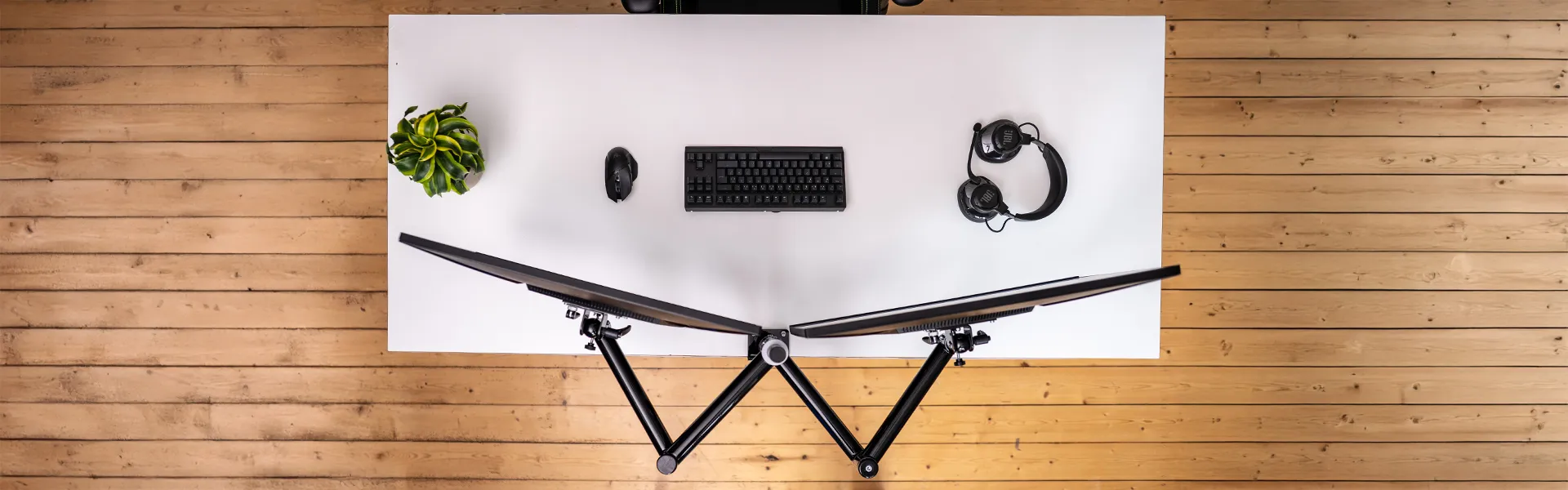 Schwarze Monitorhalterung TFT-Vario mit 2-armigem Gelenkarm, flexibel einstellbar für ergonomisches Arbeiten.